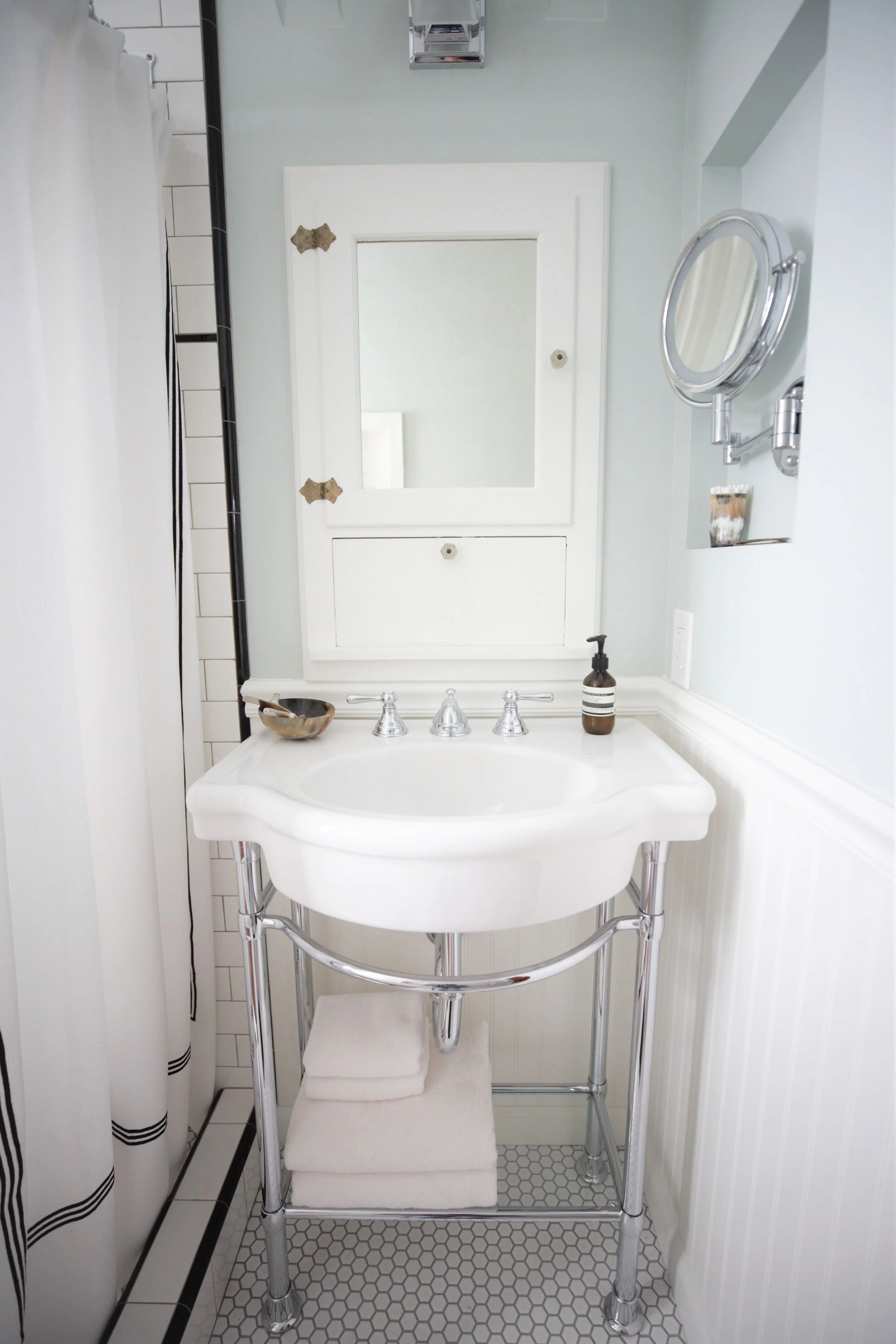 Chula Vista 1929 Storybook bathroom vignette in Chula Vista, California by Madelene Ross Design Studio